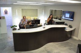 Immigration bond agent consulting with family